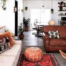 Load image into Gallery viewer, brown moroccan pouf in living room by maison morocco